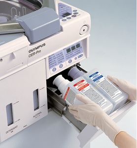 lot 84 image: MSRP $300 NEW Olympus 1065mL Acecide-C OER-Elite High-Level Disinfectant and Sterilant -peracetic acid-based (PAA) chemical germicide designed for the&nbspOlympus OER-Elite endoscope reprocessor Box Has Wear