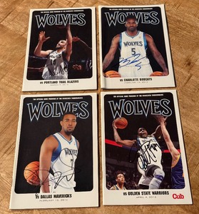 lot 96 image: (4) Signed Minnesota Timberwolves Basketball Programs - Nikola Pekovich, Derrick Williams, Anthony Tolliver, Martell Webster