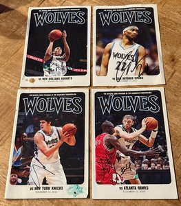 lot 101 image: (4) Signed Minnesota Timberwolves Basketball Programs - Darko Milicic, Corey Brewer, Ryan Hollins, Oleksiy Pecherov