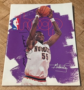 lot 130 image: Dikembe Mutumbo Signed NBA Hoop Magazine