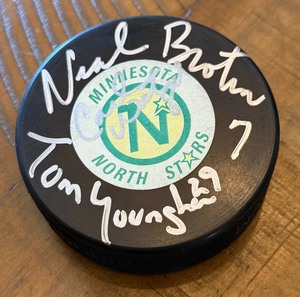 lot 15A image: Neal Broten, Tom Younghand and Carl Wetzel Signed Minnesota North Stars Hockey Puck