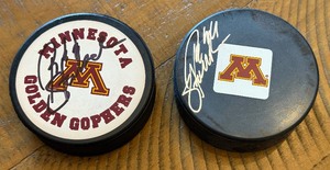 lot 24A image: (2) University of Minnesota Hockey Signed Pucks