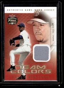 lot 46A image: Pedro Martinez Game-Worn Jersey Relic 2003 Fleer Focus Jersey Ediition Team Colors #TC-PM Baseball Card