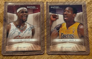 lot 91B image: Kobe Bryant  LeBron James 2004-05 Skybox Autograph Basketball Card Lot