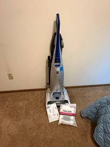 lot 63 image: Kenmore Upright Vacuum with HEPA Filtration and Bags
