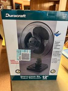 lot 93 image: Duracraft 12 Inch Oscillating Table Fan DT-124 Black in Box