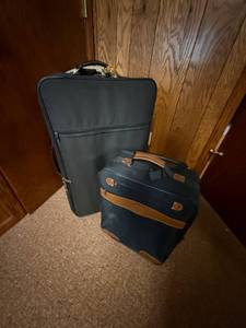lot 105 image: Set of 2 Rolling Suitcases with Leather Accents
