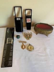 lot 26 image: Vintage Jewelry and Accessories Collection with Magnifiers and Decorative Trinket Box