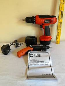 lot 31 image: Black & Decker FireStorm 12V Drill and Work Light Screwdriver Set with Charger