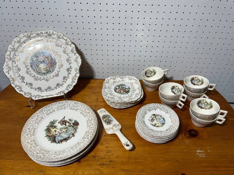 lot 154 image: Vintage Porcelain Dinnerware Set with Cups, Plates, and Pastry Server