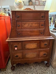 lot 13 image: Vintage Wooden Dresser with Ornate Detailing