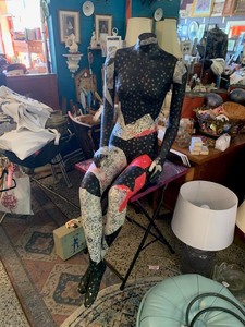 lot 144 image: Mannequin, seated position with Collage pattern