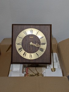 lot 57A image: Hermin Wall Clock with Brass Roman Numerals and Chain Pendulum