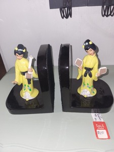 lot 100 image: Pair of Vintage Asian-Inspired Lady Bookends with Yellow Robes