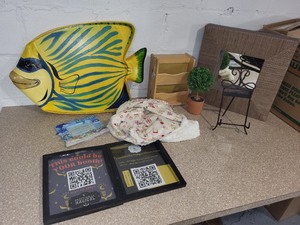 lot 106 image: Decorative Home Decor Collection with Fish Plaque, Key West Frame, Mirror, and More