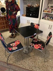 lot 62 image: Square Black Bistro Table with 3 Floral Upholstered Chairs