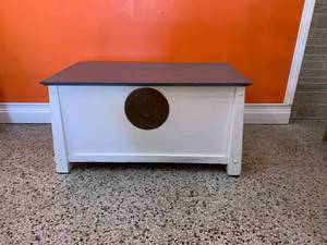 lot 227 image: Wooden Storage Chest with Handles and Decorative Metal Accent, 36 Inch