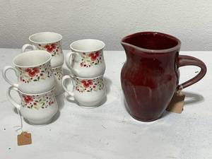 lot 95 image: Set of 6 Floral Porcelain Mugs and Burgundy Ceramic Pitcher