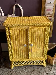 lot 163 image: Yellow Wicker 2-Door Cabinet with Shelves