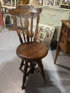 lot 12 image: Ornate Vintage Wooden Chair with Carved Details