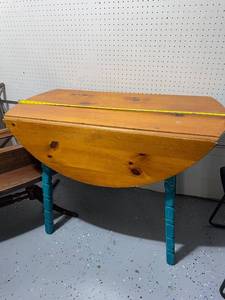 lot 72 image: Vintage Drop-Leaf Table with Rustic Finish and Measuring Tape