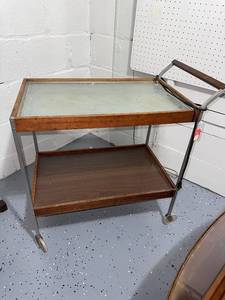 lot 78 image: Vintage MCM Rolling Bar Cart with Glass Top and Wood Shelving