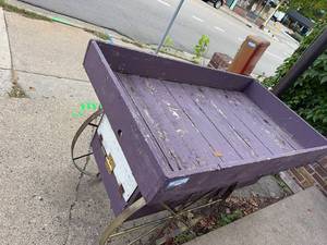 lot 102 image: Vintage Wooden Cart with Brass-Colored Wheels - Rustic Purple Finish
