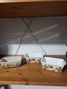 lot 24E image: Set of 3 Garden Ridge Mini Ceramic Loaf Pans with Fruit and Harvest Designs