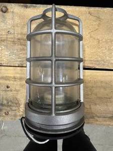 lot 34 image: Five Vapor Tight Lighting Fixtures (586140) with Cages