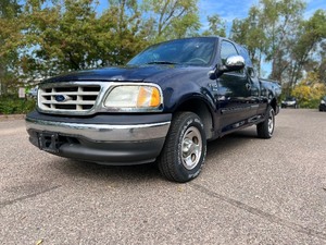 lot 4 image: 2002 FORD F-150 LARIAT 123k Miles  1 Owner  4x4  No Accidents (NO RESERVE)
