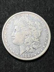 lot 35 image: 1884 US MORGAN SILVER DOLLAR