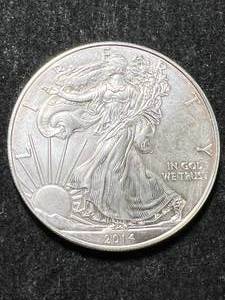 lot 42 image: 2014 AMERICAN SILVER EAGLE 1 TROY OZ .999 FINE SILVER