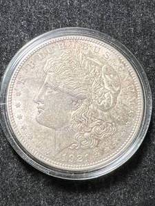 lot 61 image: 1921 US MORGAN SILVER DOLLAR IN AIRTITE