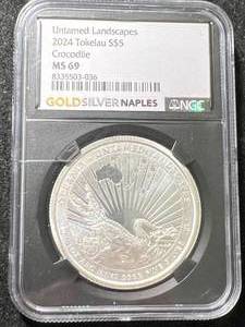 lot 63 image: 2024 TOKELAU CROCODILE 1 TROY OZ .999 FINE SILVER NGC MS69