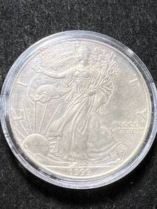lot 78 image: 1999 AMERICAN SILVER EAGLE 1 TROY OZ .999 FINE SILVER IN AIRTITE