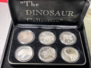 lot 85 image: 6 TROY OZ .999 FINE SILVER THE DINOSAUR COLLECTION