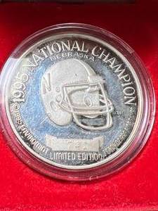 lot 88 image: 1 TROY OZ .999 FINE SILVER 1995 NEBRASKA NATIONAL CHAMPION ROUND