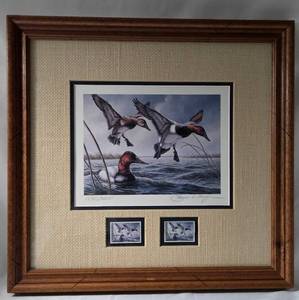 lot 6 image: 1980 Waterfowl Stamp and print by James Meger. Print number 17903500. Includes two $3 Migration Waterfowl Canvasbacks stamps. 18 12L x 7 12 W.  