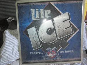 lot 56 image: Miller Lite Ice 30in - metal sign...