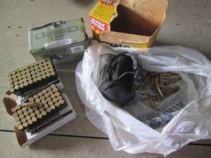 lot 135 image: Healthy supply of Remington 45 auto...