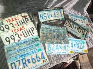 lot 145 image: Assortment of license plates and pl...