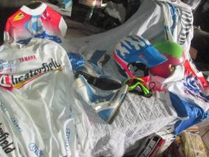 lot 159 image: Motorcycle type helmets, shirts and...