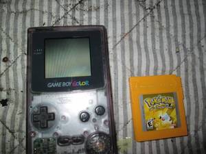 lot 211 image: Game boy color with Pac-Man and Pok...