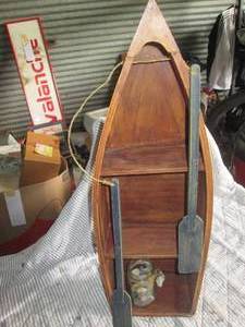 lot 247 image: Boat shaped 36 wood display shelf...