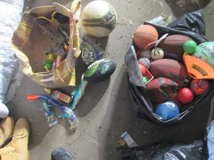 lot 257 image: Sports ball lot with misc kids toys...