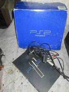 lot 267 image: Sony PS2 game console with original...