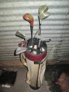 lot 285 image: Vintage Golf bag with a variety of ...