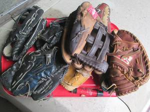 lot 103 image: Baseball glove grouping. Some for a...