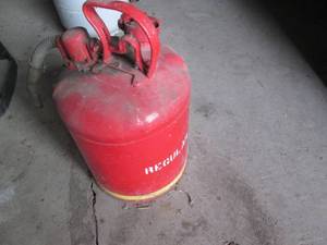 lot 113 image: Vintage metal gas can with long pou...