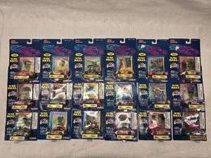 lot 15 image: (18) 164 Scale Nascar Collectables Cars with Trading Card and Display Stand